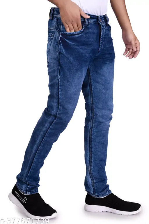 Blue denim men's casual jeans pant with regular fit and dyed/washed pattern. Versatile, comfortable clothing item for work or leisure. Waist sizes: 28, 30, 32; Length size: 41 inches. Made in India