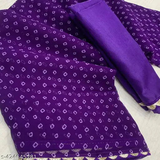 Purple bandhani sari with golden lace, featuring intricate patterns and borders