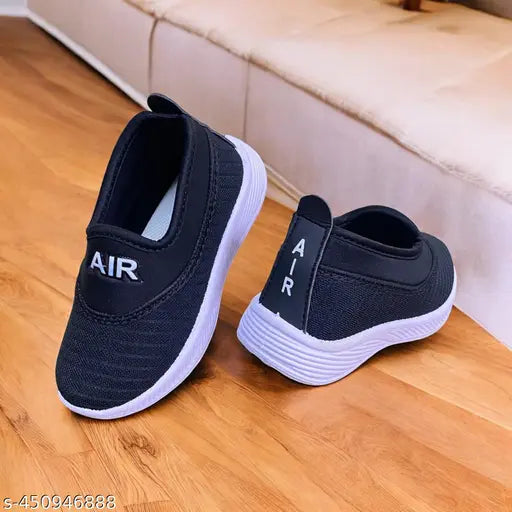 A pair of black kids' slip-on shoes, suitable for daily wear and parties