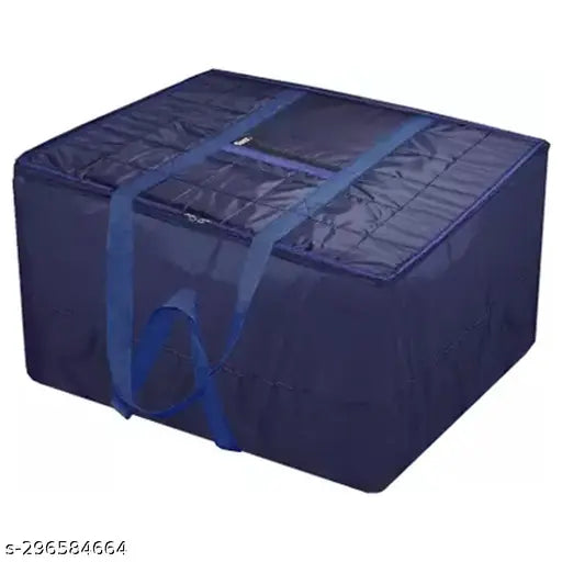 Blue and black bag with strap for carrying a peafowl blanket cover. Large, versatile storage option suitable for sarees and household use