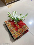 Embroidered red silk saree with intricate paisley pattern