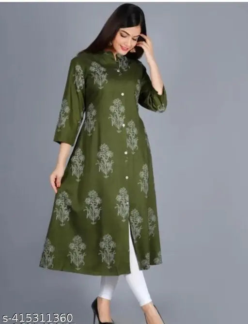 Rayon printed high-slit kurti-like gown with three-quarter sleeves, featuring pockets. Women's fashion from India