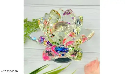 Transparent glass crystal lotus for Vastu Feng Shui, promotes positive energy, good luck, prosperity, and love. Dimensions: 1.5" x 1.5" x 1.5". Indian brand, Misha