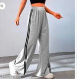 Grey jogger pants with white stripes