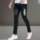 Black casual slim-fit jeans with white lettering