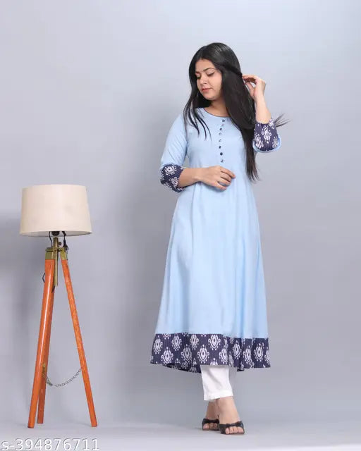 Rayon flared solid kurti with printed border, elegant women's fashion from India