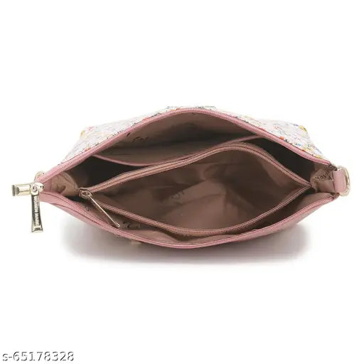 Pink sling handbag with flap closure