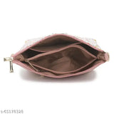 Pink sling handbag with flap closure