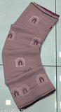 Purple fabric with white trim, possibly traditional Indian clothing
