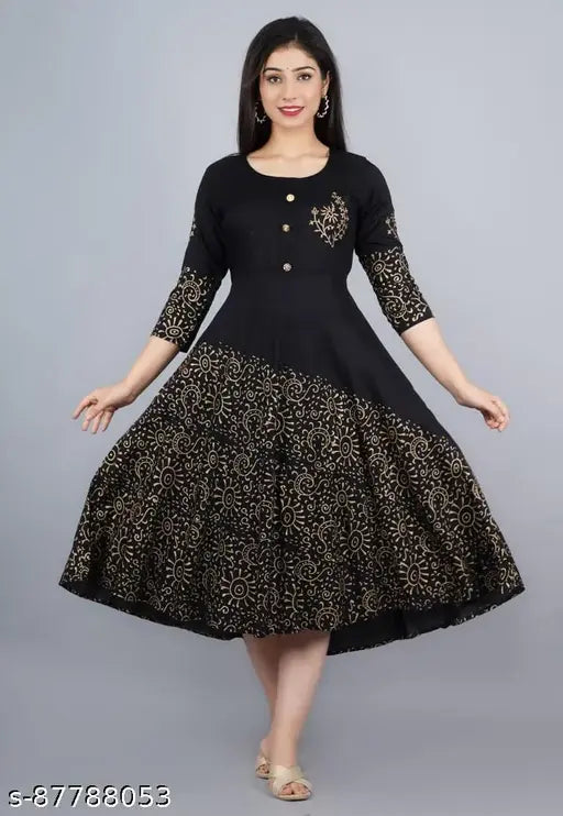 Black and gold printed long kameez with long sleeves and a high neckline. This party wear dress could be worn for various occasions like parties, festivals, or special events in Indian culture