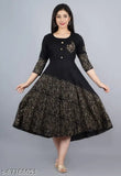 Black and gold printed long kameez with long sleeves and a high neckline. This party wear dress could be worn for various occasions like parties, festivals, or special events in Indian culture
