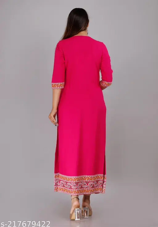 Pink salwar kameez with embroidered borders and detailing