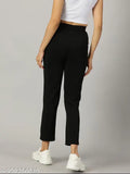 Black polyester skinny fit trouser, elastic band closure, ankle length