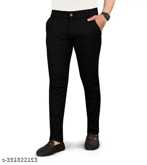 Black solid cotton lycra single chino pant for men's regular fit, versatile and suitable for various occasions. Classic black dress pants with a tailored fit. Sizes: 28 (Waist 28in, Length 37in), 30 (Waist 30in, Length 38in), 32 (Waist 32in, Length 39in), 34 (Waist 34in, Length 40in). Made in India
