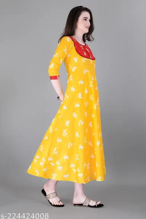 Yellow rayon long flared skirt with pompom detail and designer label
