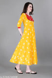Yellow rayon long flared skirt with pompom detail and designer label