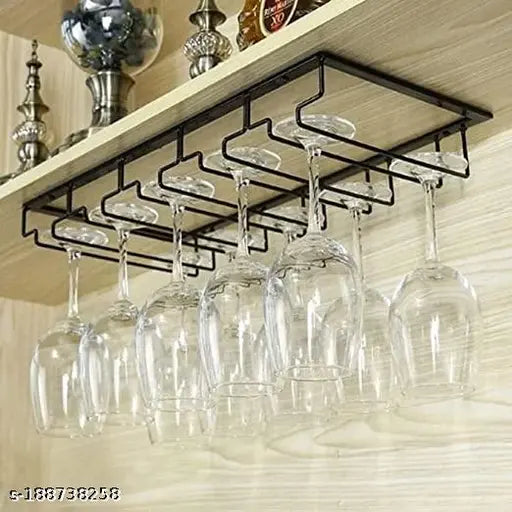 Black metal wine glass rack hanging on a wall