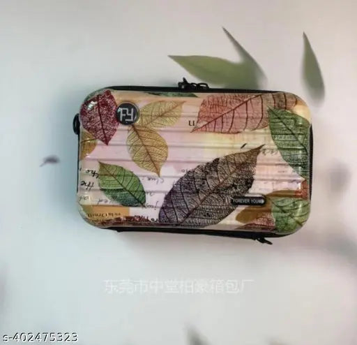 Attractive women's slingbag, black leather with floral design