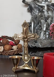 Golden brass Christian cross idol with attached candle stand, antique finish for prayer and worship decor" (123 characters)