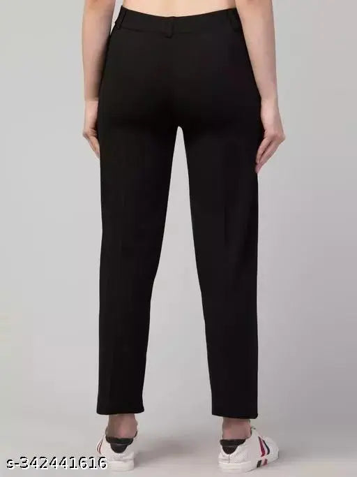 Solid cotton-lycra Anara Fashion trousers with two front pockets, ideal for women's casual wear. High rise, regular length