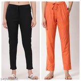 Black cropped trousers, orange wide-leg trousers