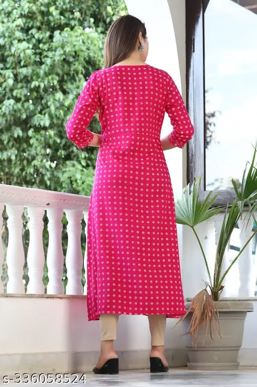 Rayon a-line kurta with three-quarter sleeves, printed combo. Indian fashion clothing on model