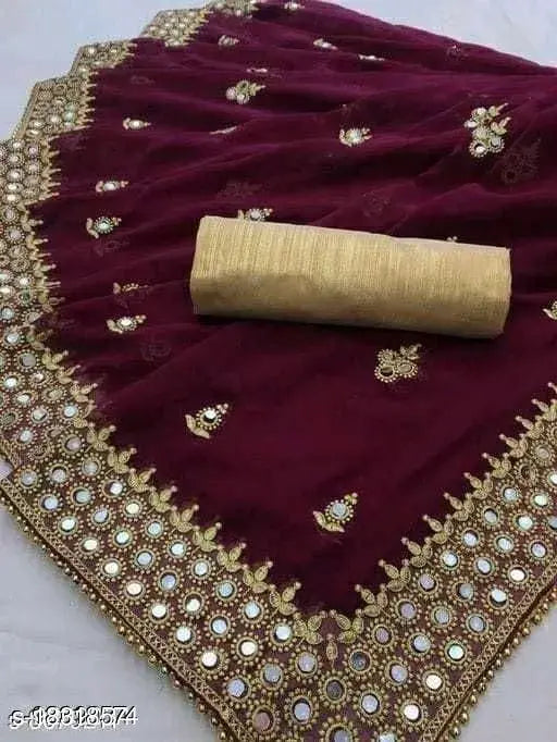 Red and gold saree with mirror work design
