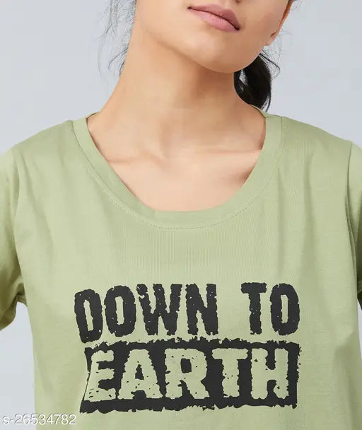 Green cotton short sleeve women's typography t-shirt by CHIMPAAANZEE, featuring printed pattern