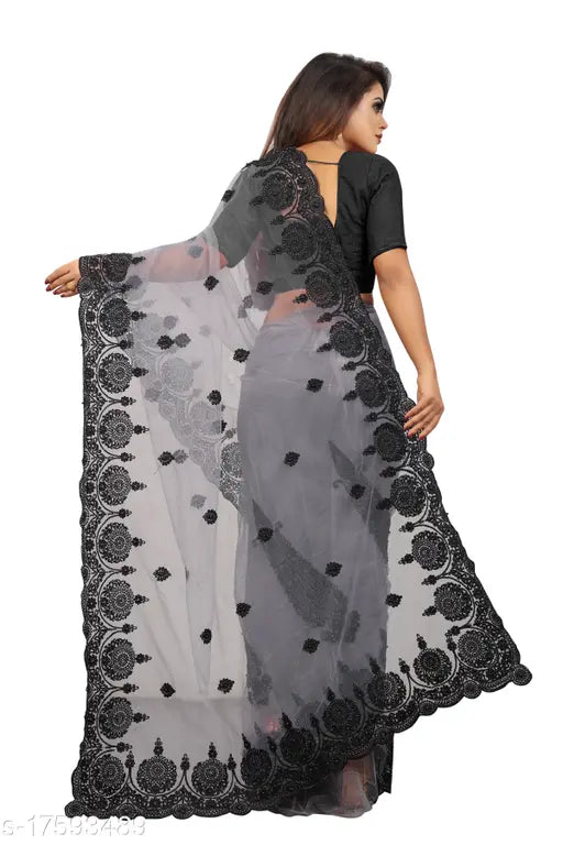 Embroidered net saree from Charvi Drishya, single free size (5.5m), solid satin blouse piece