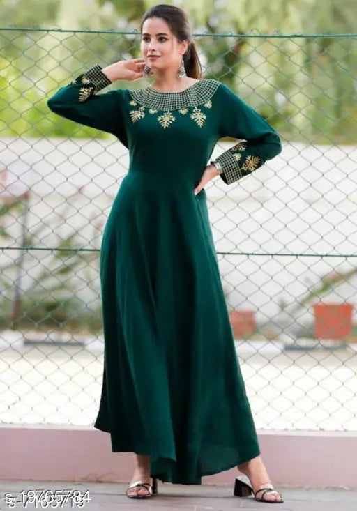 Stylish retro rayon blouse with three-quarter sleeves and embroidered pattern, vibrant women's fashion from India