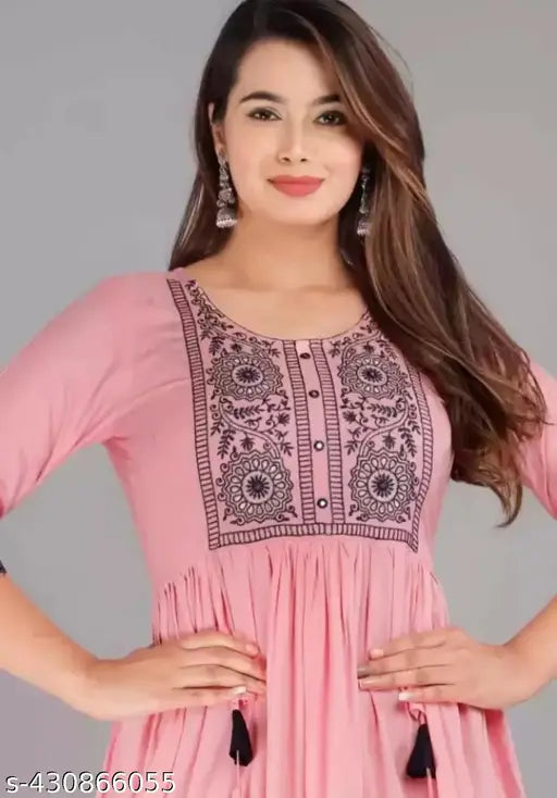 Pink Vicose Rayon below knee gown with embroidered front panel, three-quarter sleeves, and side tassel - Indian festive wear