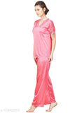 Pink silky satin pyjama set, free size, solid pattern on display rack