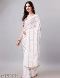 White sari with intricate sequin detailing, adorned in a traditional drape