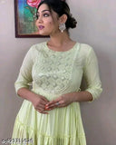 Green lurex cotton embroidery kurta set with three-quarter sleeves, solid pattern. Light green fashionable gown, cotton green gown, available in sizes S to 6XL, originating from India