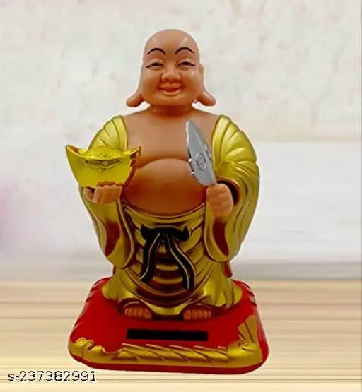 Golden polyresin GEETA S Solar Laughing Buddha with moving head, holding ingot and waving fan, for Vastu-compatible health, wealth, and prosperity showpiece - 13 cm (Gold plated)