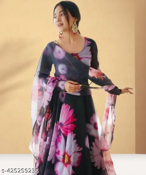 Women's black georgette fit-and-flare Anarkali gown with vibrant sunflower print, long sleeves, perfect for casual or formal events. Made in India