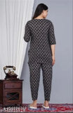 Black floral print cotton kameez with matching pants for women's formal wear