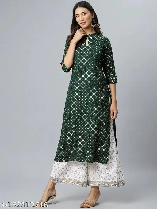Rayon kurta set with palazzos, printed net design, three-quarter sleeves. Indian women's fashion, classy rayon fabric