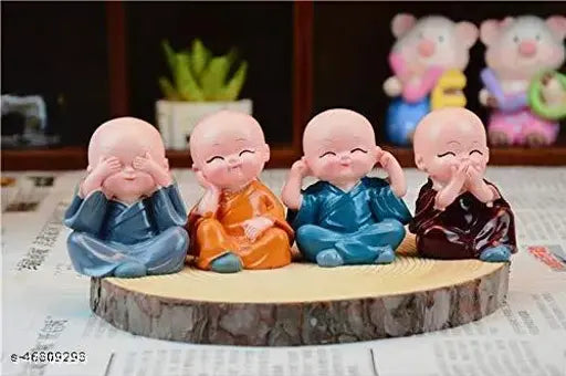 Multi-colored Feng Shui Baby Monk Buddha showpieces set, 4 pieces, ethically sourced polyresin, ideal for car dash, living room, office decoration (7x5x12cm)