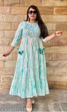 Green embroidered printed festival gown by Maheen Exports