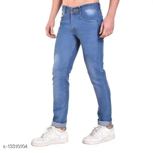 Men's blue denim skinny jeans with rolled cuffs