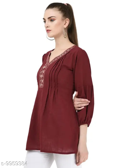 Maroon rayon embroidery top, three-quarter sleeves, SAAKAA women's fashion on mannequin, India origin