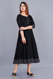 Stylist women's solid printed round pleated flared rayon kurti (Black), 3/4 sleeve, hand washable, suitable for casual and formal occasions, fits regular body type. Size: XS-XXXL, length: 48". May vary slightly due to lighting sources or monitor settings. Made in India
