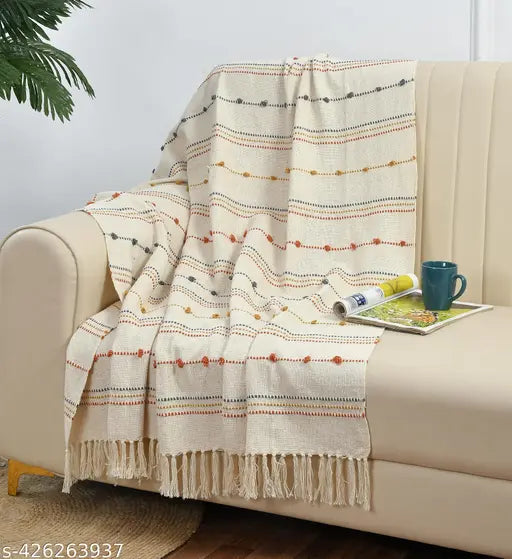 Handwoven 100% Cotton Laze Throw, natural color palette, artisanal craftsmanship, generous size (52x70 inch), soft and breathable. Indian-made sustainable home decor accessory