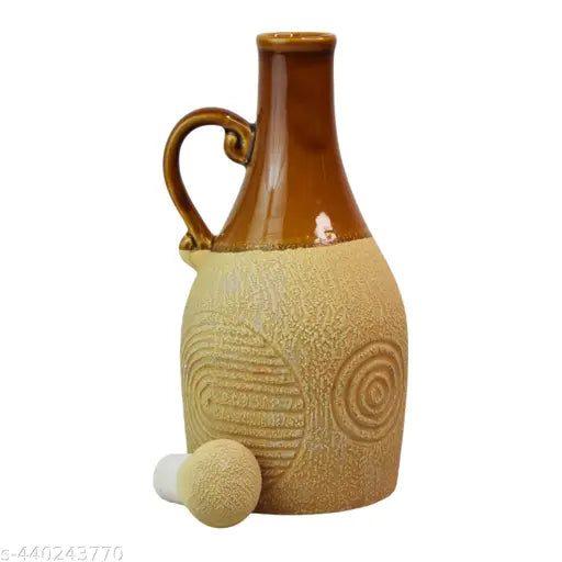 Handcrafted ceramic oil dispenser bottle with a matching lid