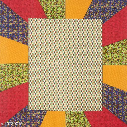 Multi-colored cotton double bed sheet set with two pillow covers, vibrant pattern on queen-sized bed and matching pillows, made in India