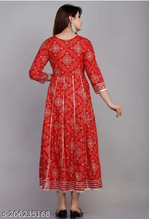 Designer Bandhani rayon kurti with heavy embroidery, three-quarter sleeves, dyed/washed pattern. Indian ethnic women's fashion on mannequin