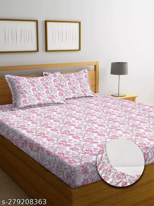 White DWORTH Premium Cotton Elastic Fitted Bedsheets, double bed size with all-around elastic and 2 pillow covers. Floral pattern, superfine quality, and 220 thread count for a summer sleep experience. Made from 100% peached cotton