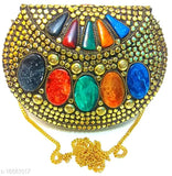 Colorful, vibrant women's clutch purse with multiple stones and a unique design