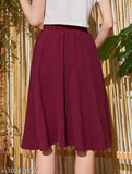 Maroon cotton-blend flared knit skort with high waist and pleats, great for casual outings or work events